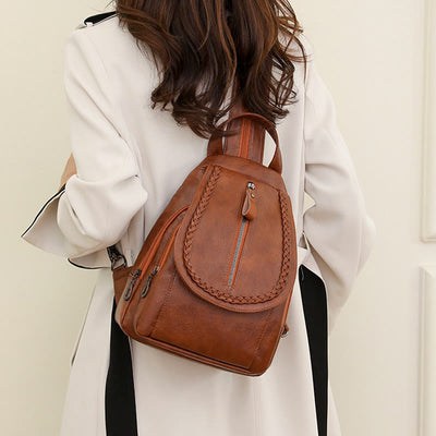 Twist Clamshell Leather Backpack Convetible Sling Bag For Women